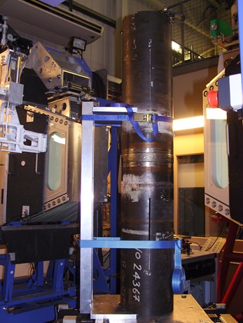 Figure 5 – Residual stress measurement set-up at ISIS b) Set-up for the measurement of radial and hoop strains
