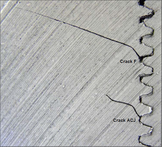 Figure 14 - Two fatigue cracks from different threads