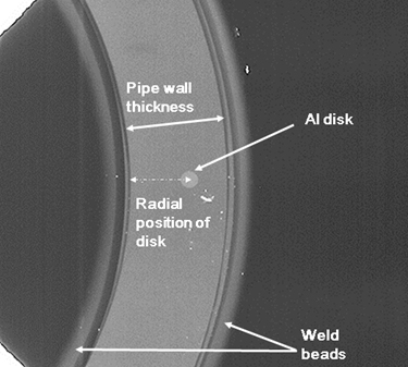 Fig.6 Radiograph showing final position of aluminum disc after welding